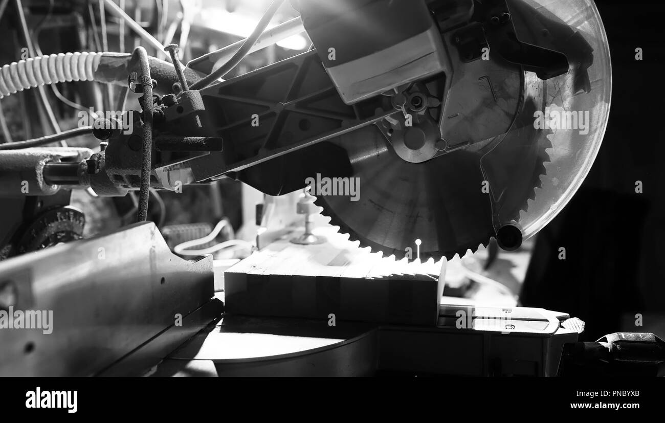 Workshop with tools and electric saws in the process Stock Photo