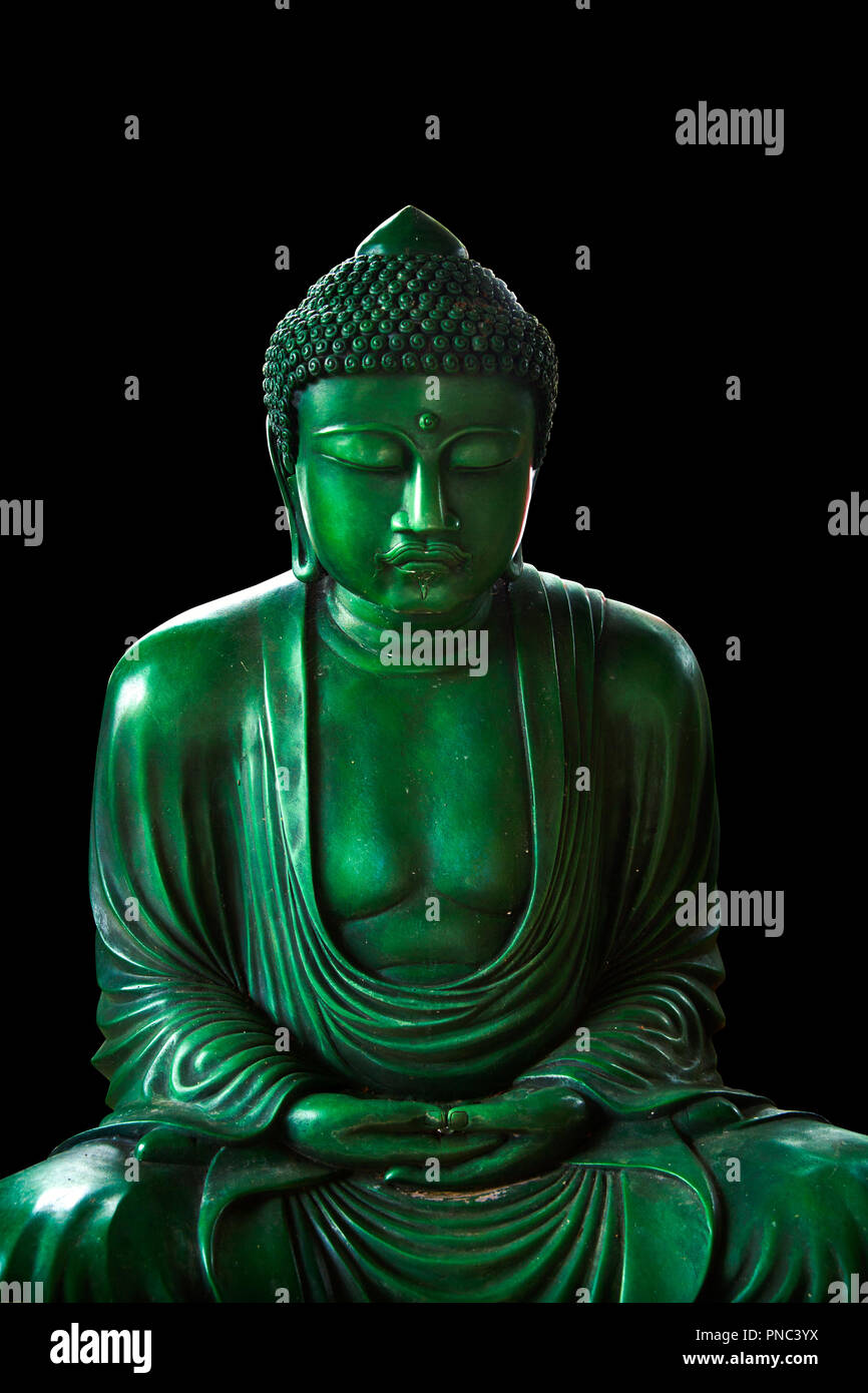 calm green emerald buddha, peaceful asian buddha zen tao religion art style statue. Stock Photo