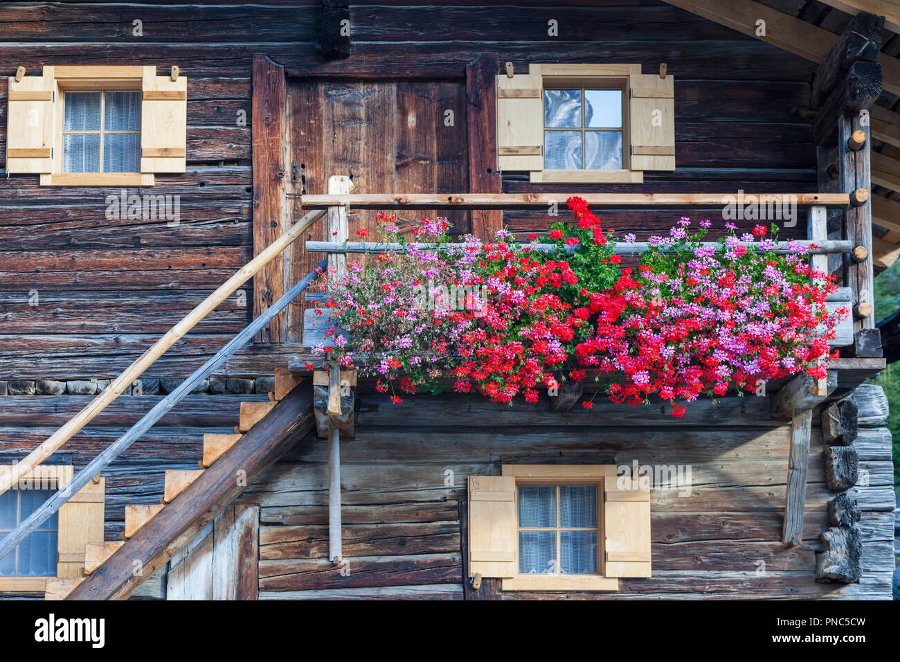 Flowering balcony on an old Alphus Stock Photo