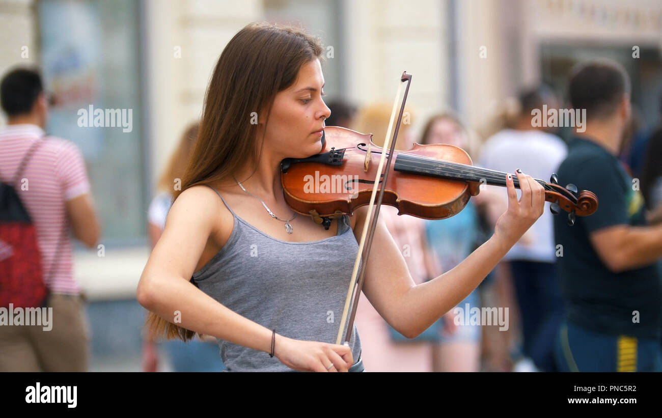 Young girl playing the vintage violin on the nature Stock Photo - Alamy