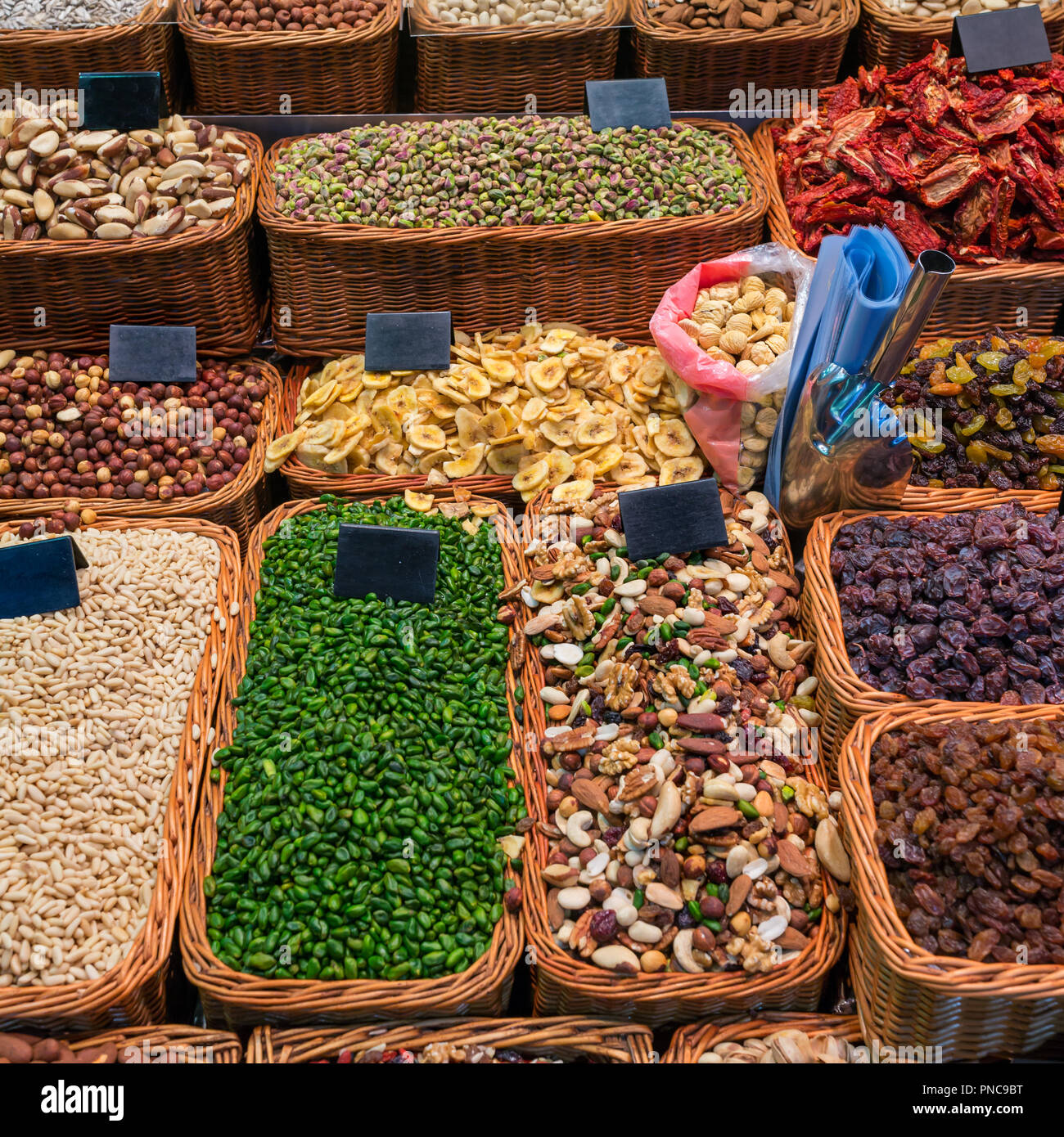 Dried fruits and nuts at market in Barcelona, Spain Stock Photo