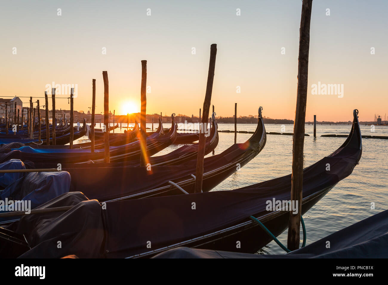 Venetian gondolas at sunrise hi-res stock photography and images - Alamy