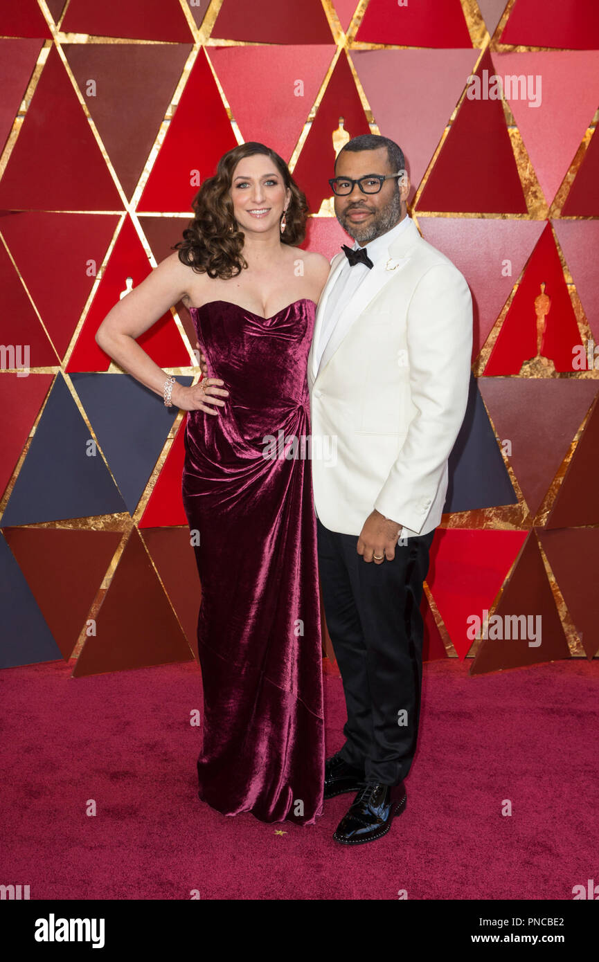 Oscar Nominee For Best Director Jordan Peele L And Wife Chelsea Peretti Arrive On The Red Carpet Of The 90th Oscars At The Dolby Theatre In Hollywood Ca On Sunday March 4
