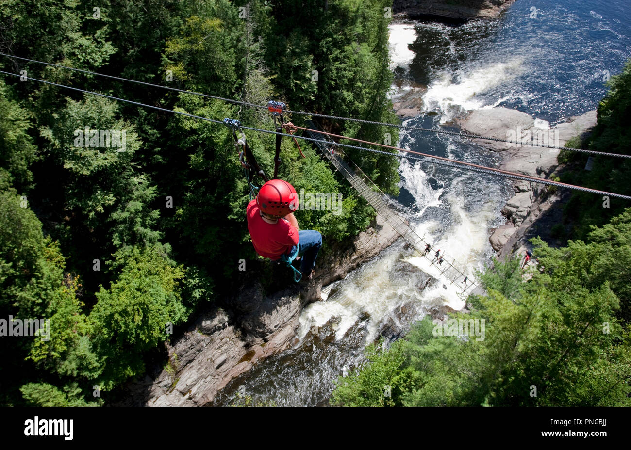 North America, Canada, Quebec, Beaupre, Canyon Ste-Anne,  boy on zip line Stock Photo