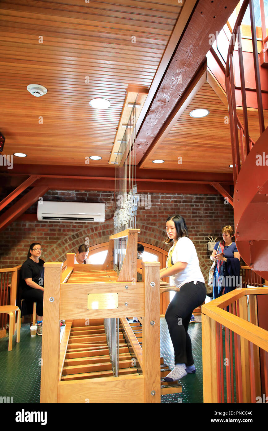 A chimesmaster playing the Cornell Chimes during a chimes concert in