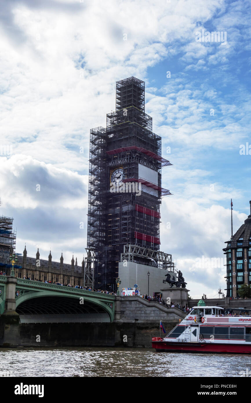Elizabeth Tower known as Big Ben with temporay scaffolding whilst undergoing refurbishment. The clock face is still visible. Stock Photo