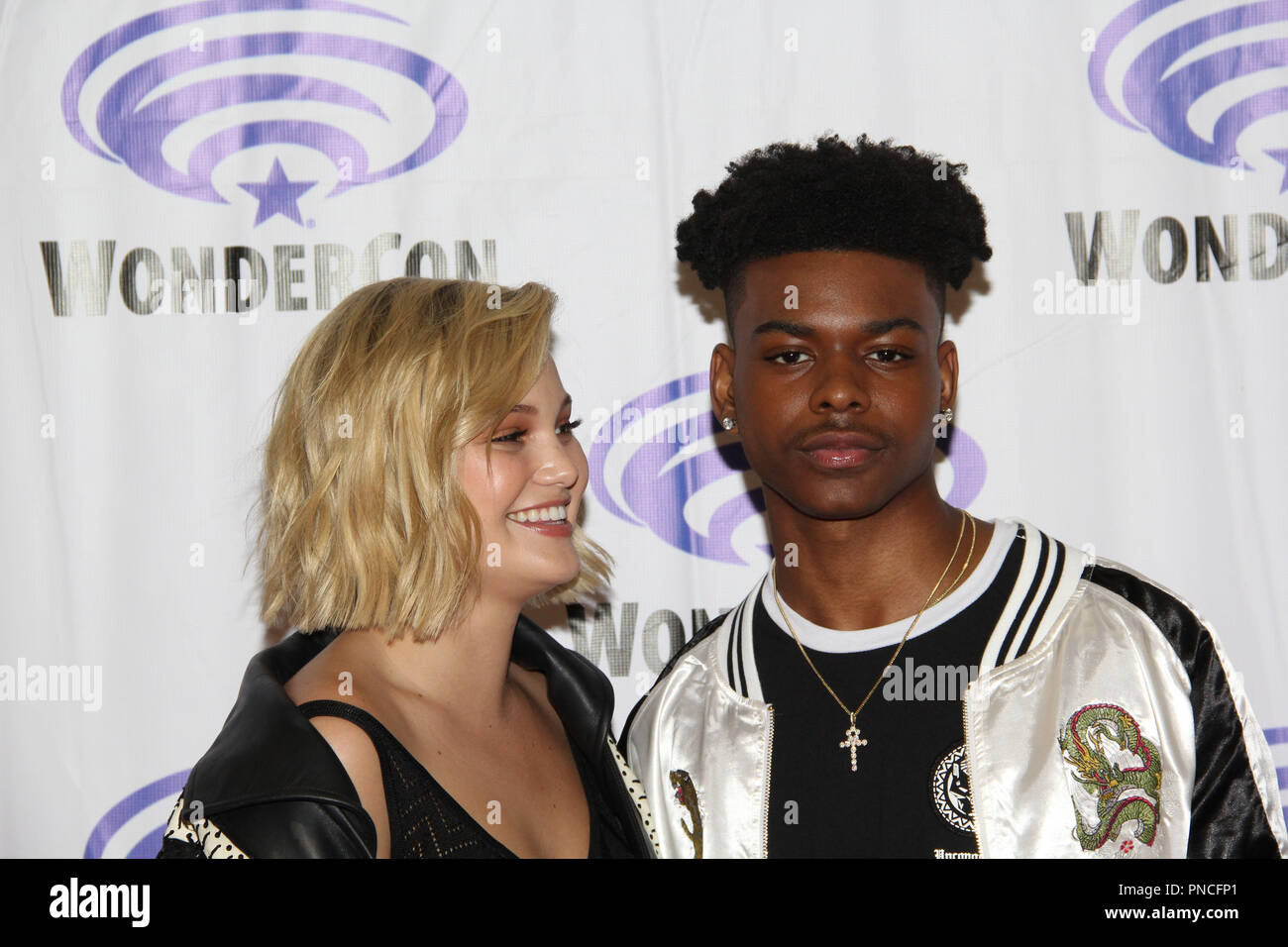Olivia Holt and Aubrey Joseph promoting Marvel's Cloak & Dagger at WonderCon Anaheim 2018. Held at the Anaheim Convention Center in Anaheim, CA. March 23 2018. Photo by: Richard Chavez / PictureLux Stock Photo