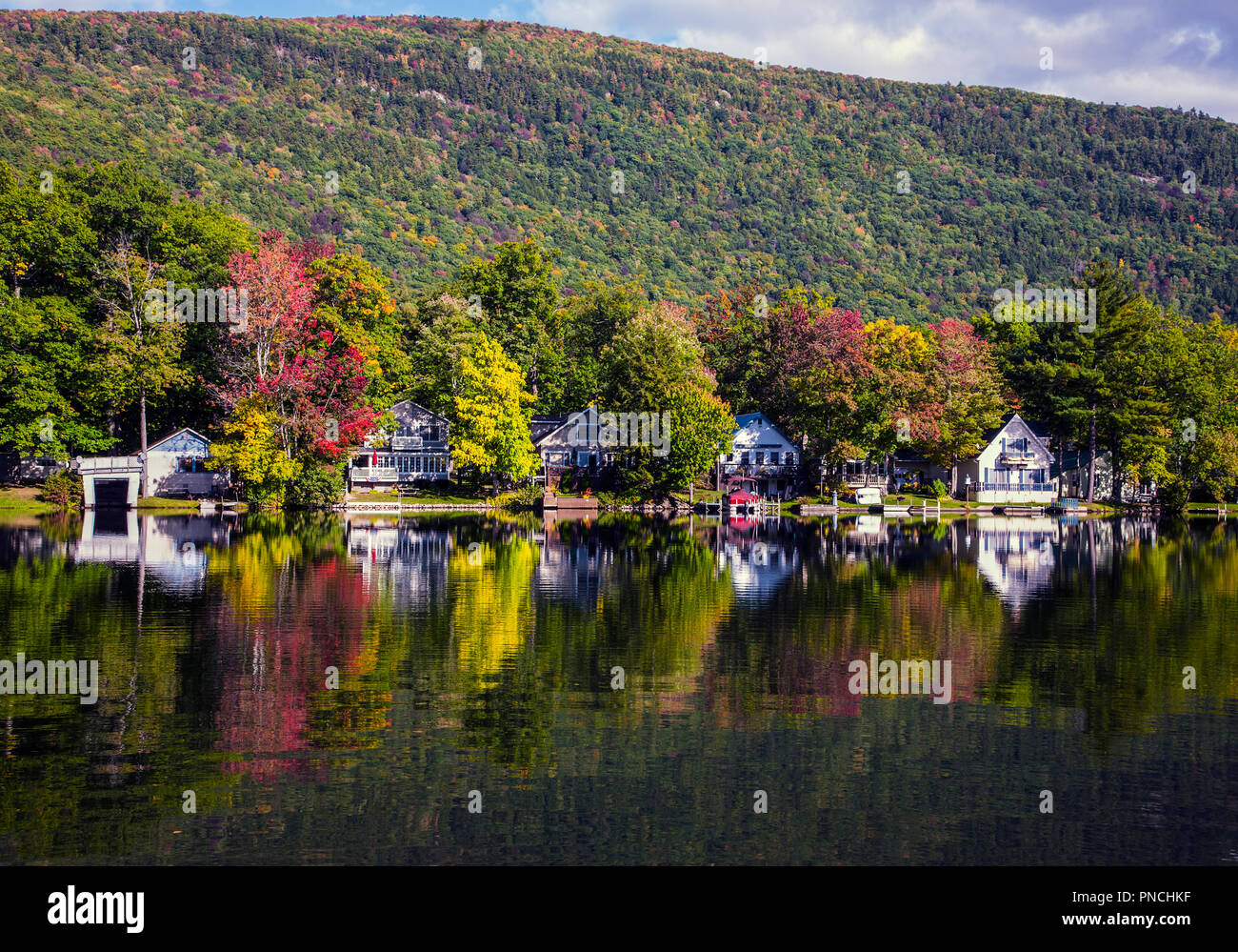 lake house autumn reflections in Vermont, fall New England autumn pond fall travel images colour scenic USA autumnal unconventional rural America Stock Photo