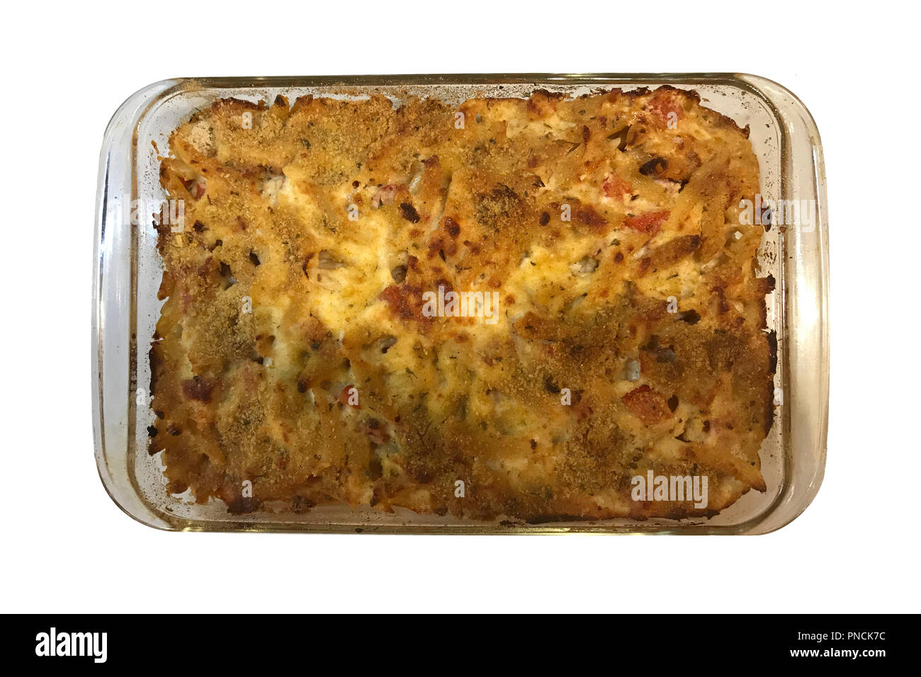 Baked mac & cheese in a glass casserole dish isolated on a white background Stock Photo