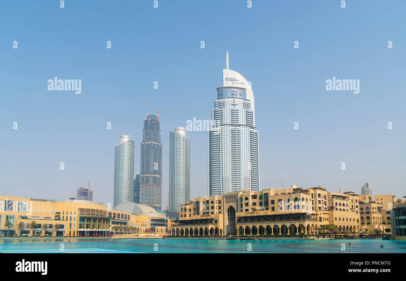 Exterior of the Dubai Mall with new high rise apartment towers under construction to rear in Dubai, United Arab Emirates. Stock Photo