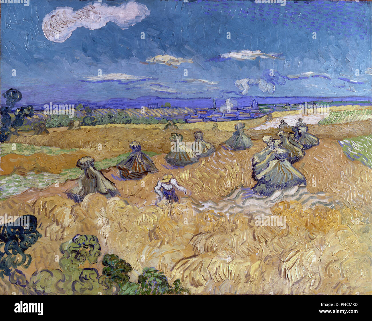 Wheat Stacks with Reaper. Date/Period: Arles, June 1888. Painting. Oil on canvas. Height: 73.6 cm (28.9 in); Width: 93 cm (36.6 in). Author: VINCENT VAN GOGH. Stock Photo