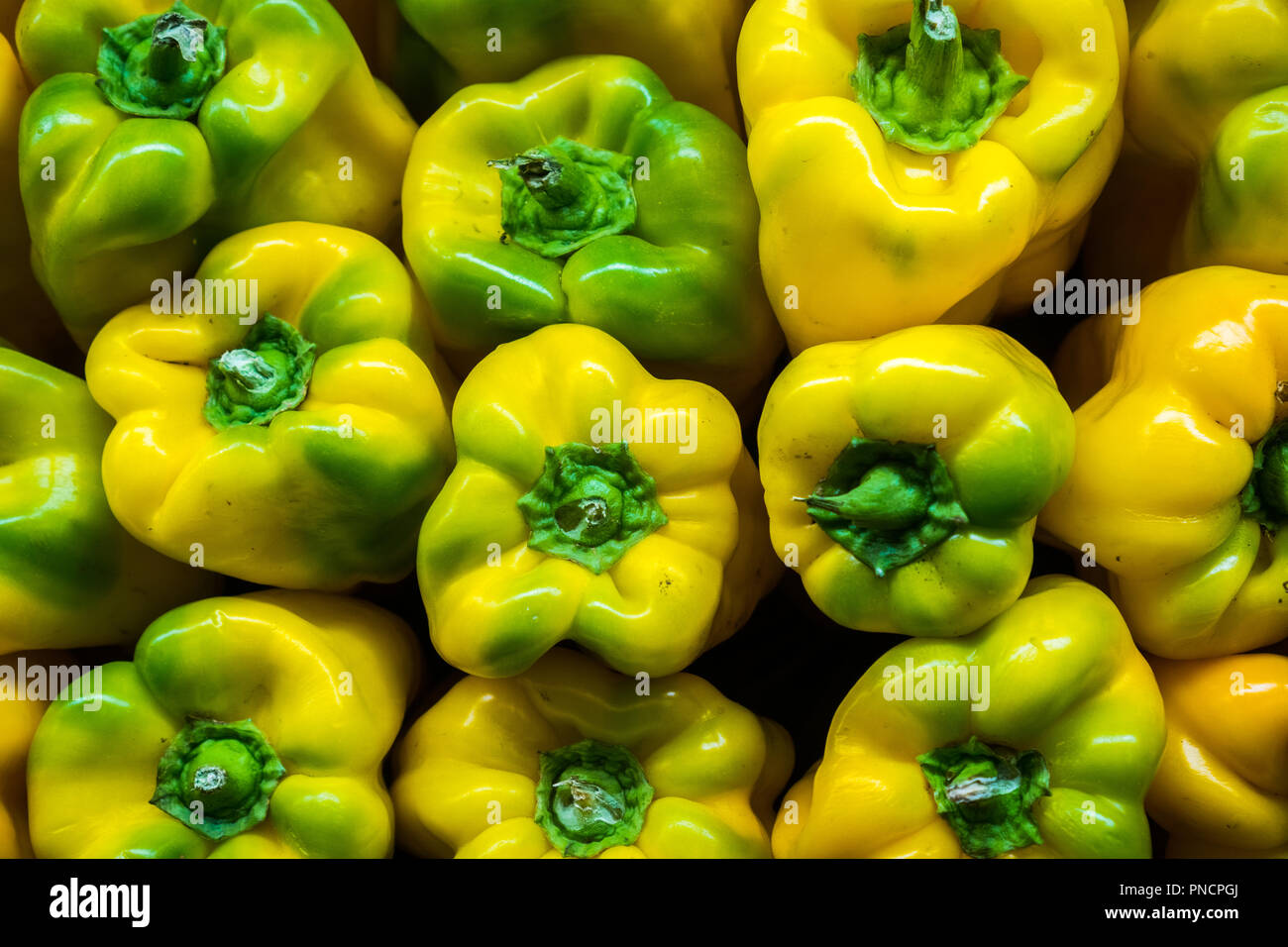 Whole fresh yellow peppers Stock Photo Alamy