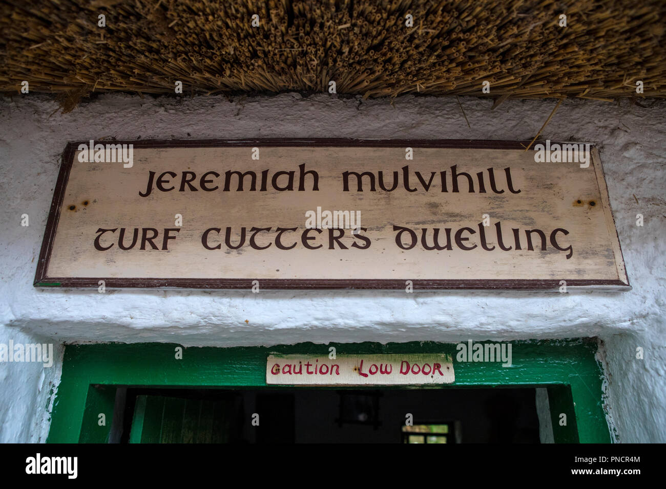 County Kerry, Republic of Ireland, August 17th 2018: The sign above the entrance to a traditional 19th Century thatched Turf Cutters Dwelling at the K Stock Photo