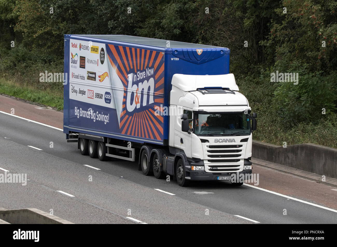 B&M Bargains HGV Heavy goods lorries, Scania trucks & trucking, logistics  transport vehicles on the M6 at Lancaster, UK Stock Photo - Alamy