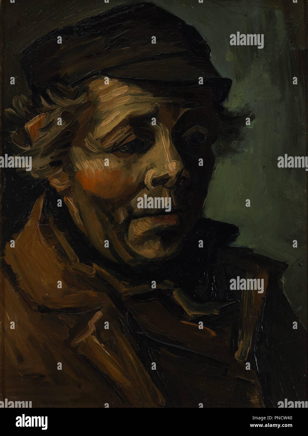 Head of a peasant withcap. Date/Period: Nuenen, December 1884. Painting. Oil on canvas. Height: 39.4 cm (15.5 in); Width: 30.2 cm (11.8 in). Author: VINCENT VAN GOGH. VAN GOGH, VINCENT. Stock Photo