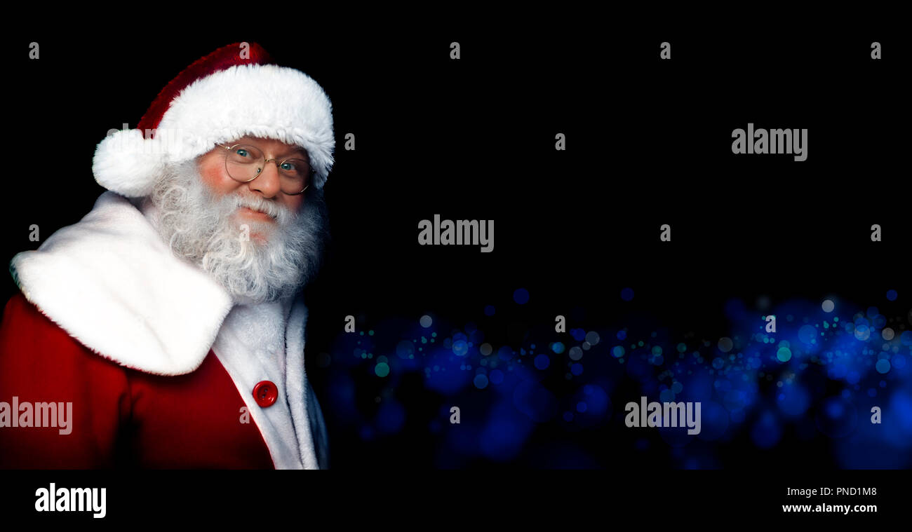 Santa Claus on Christmas concept. Close-up portrait of a fairytale Santa Claus. Good old traditions. Family holidays. Stock Photo