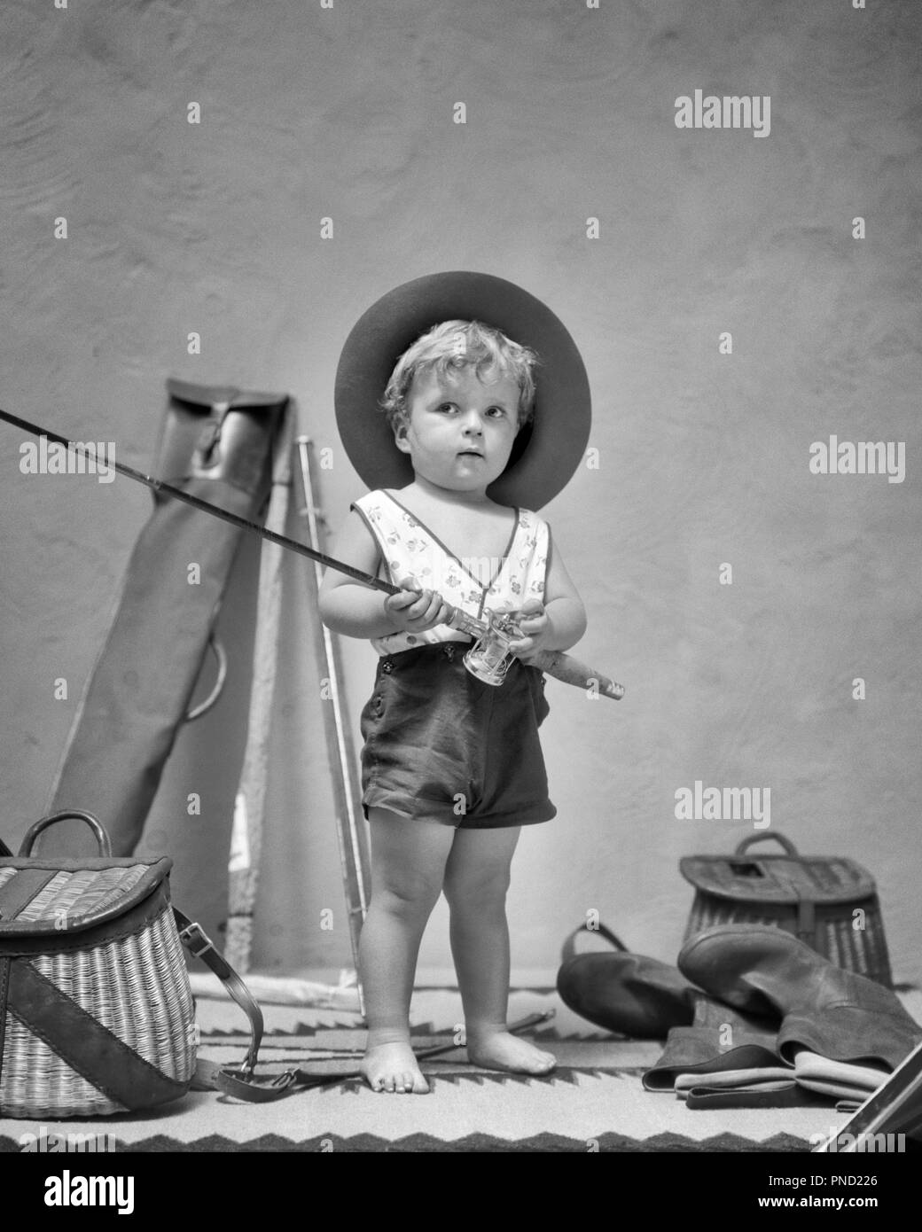 Boy fishing bait Black and White Stock Photos & Images - Alamy