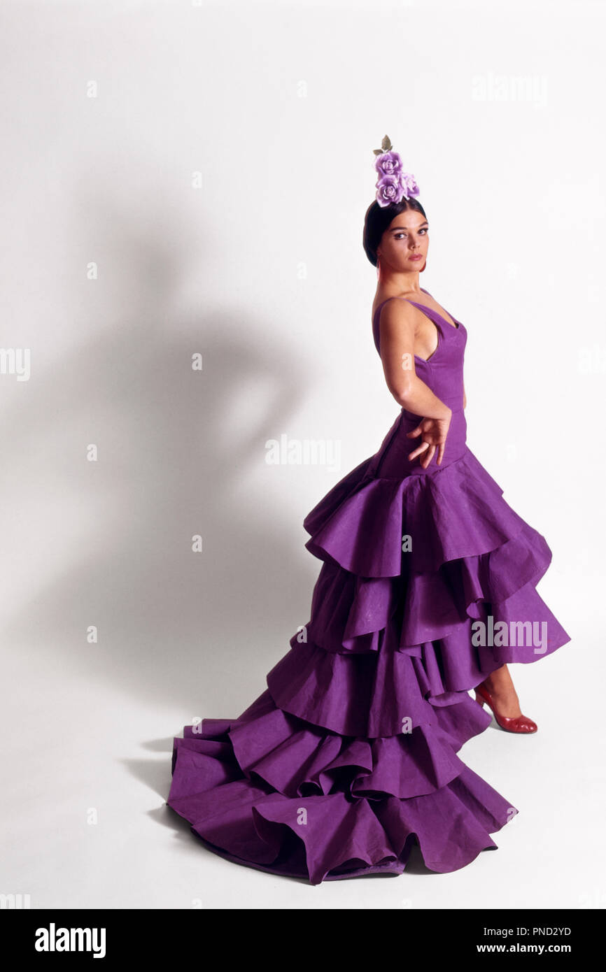 1970s SINGLE WOMAN FLAMENCO DANCER IN LATIN SPANISH LONG PURPLE DRESS LOOKING AT CAMERA EXHIBITING CHARACTER AND ATTITUDE kd3024 PHT001 HARS COMMUNICATION YOUNG ADULT SPANISH FLAMENCO MYSTERY MOVEMENT...