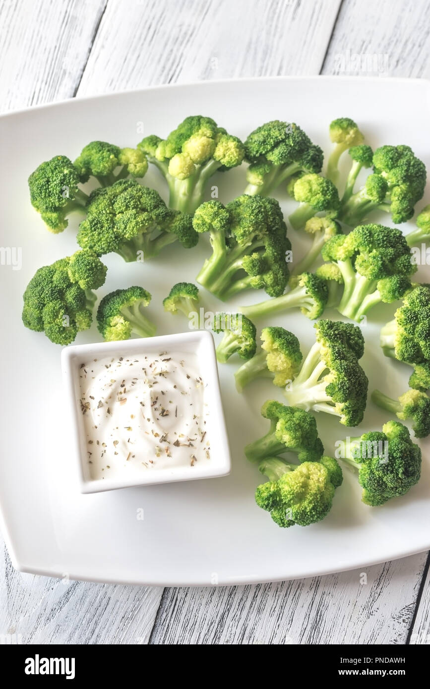 Cooked broccoli with greek yogurt Stock Photo Alamy