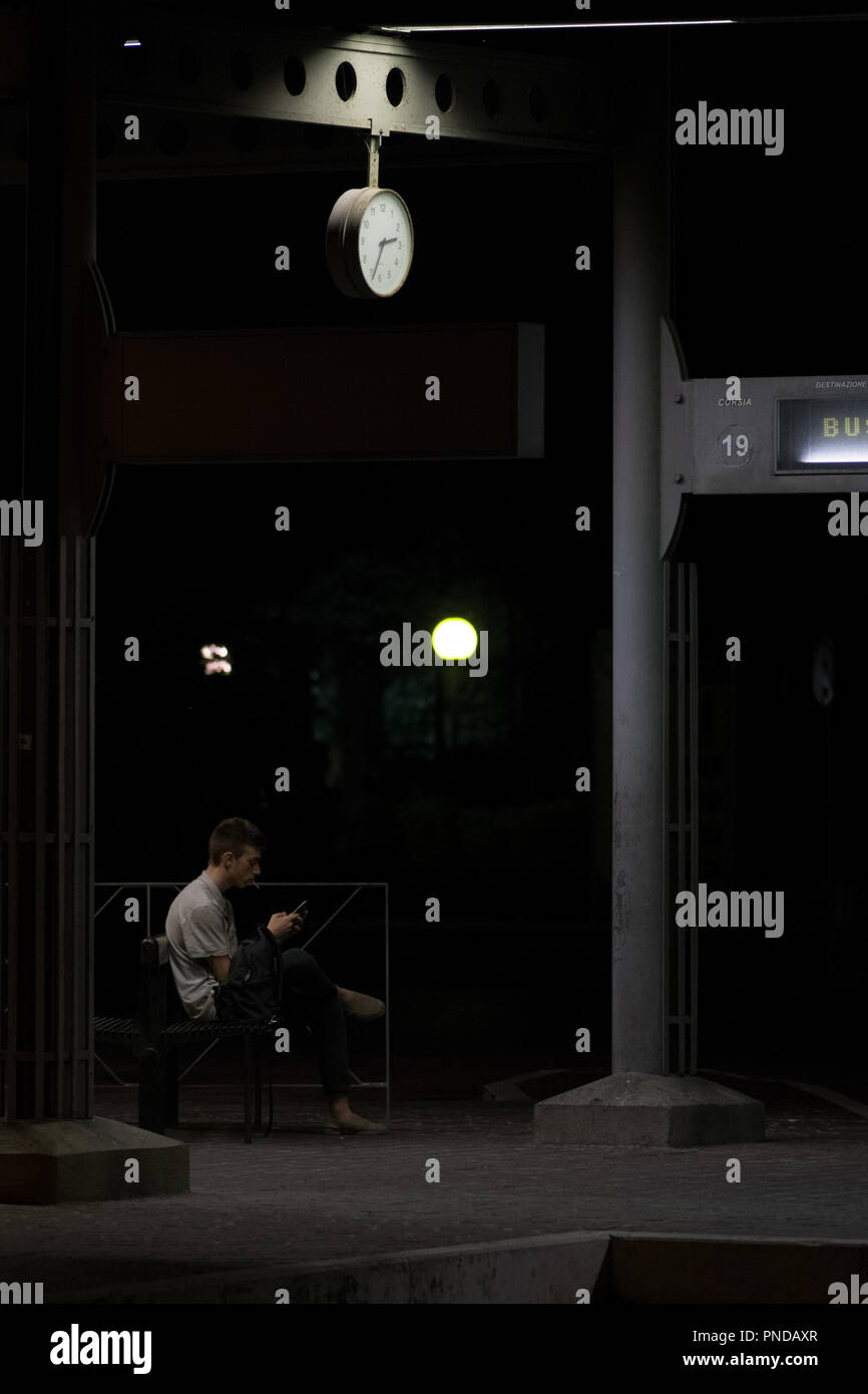 Sitting man train station hires stock photography and images Alamy