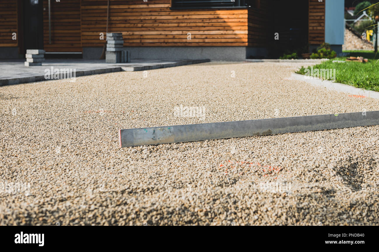 Laying Gray Concrete Paving Slabs In House Courtyard Driveway