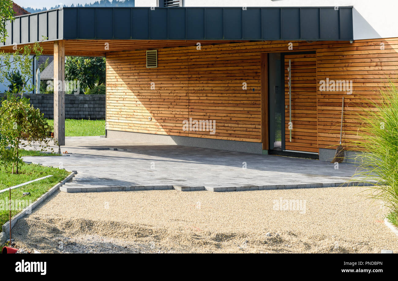 Laying Gray Concrete Paving Slabs In House Courtyard Driveway
