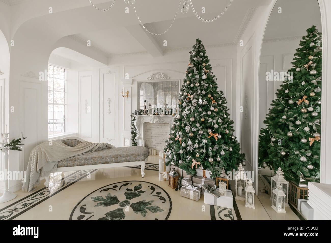 Christmas morning. classic luxurious apartments with a white fireplace