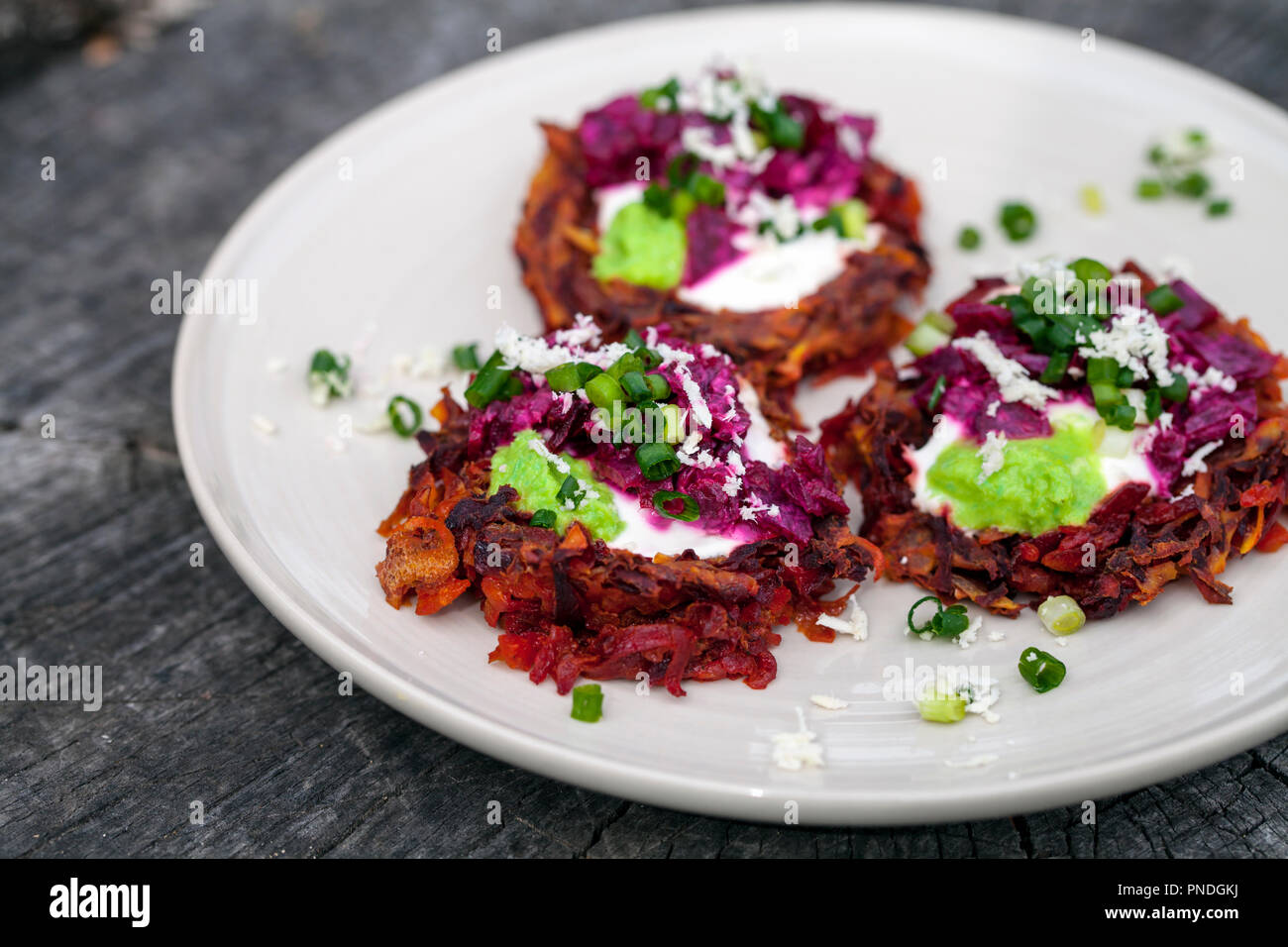 Beetroot rosti with horseradish, cream and chives Stock Photo Alamy