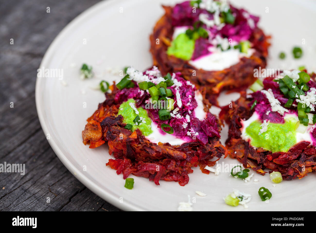 Beetroot rosti with horseradish, cream and chives Stock Photo