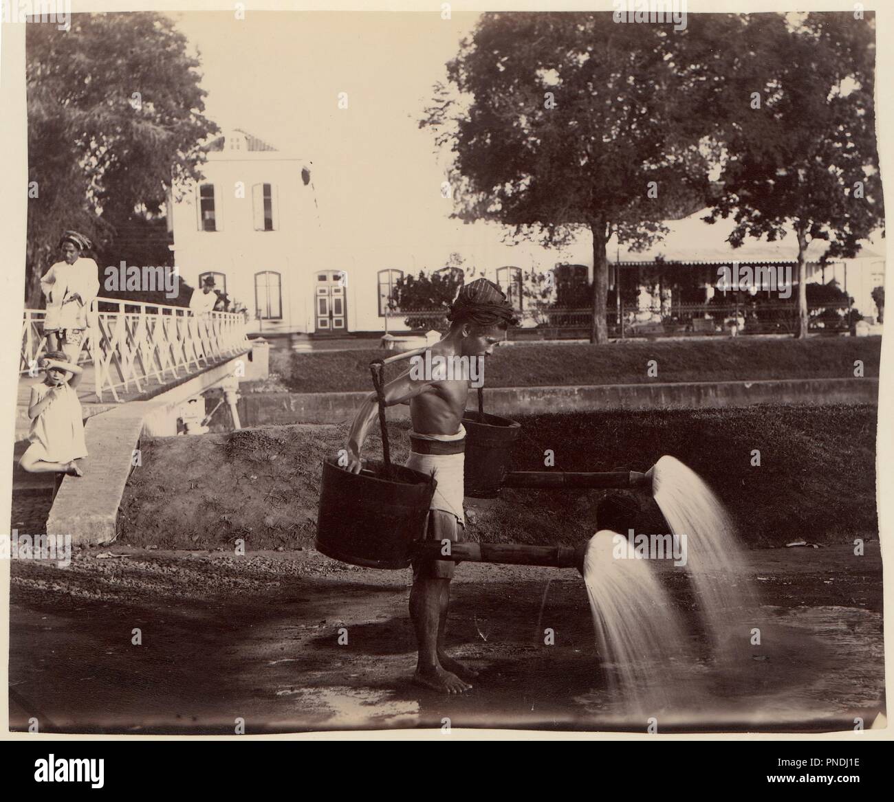 Street Sprinkler, Batavia. Artist: Unknown. Dimensions: 21.0 x 25.3 cm (8 1/4 x 9 15/16 in.). Date: 1860s-70s. Museum: Metropolitan Museum of Art, New York, USA. Stock Photo