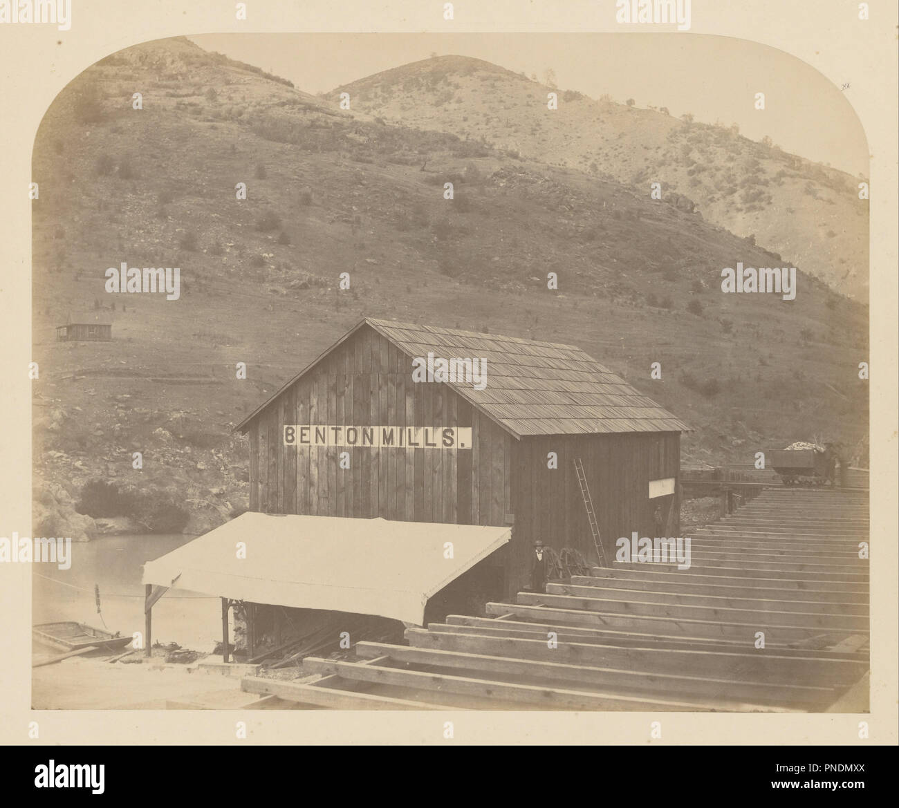 [Benton Mills]. Date/Period: 1860. Print. Salt. Height: 335 mm (13.18 in); Width: 413 mm (16.25 in). Author: Carleton Watkins. Stock Photo