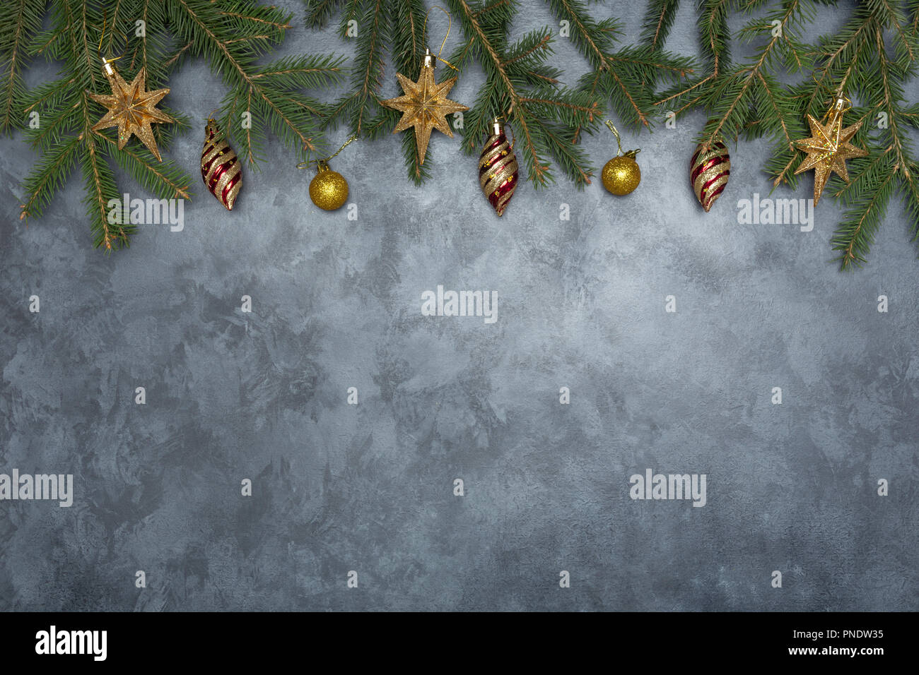holiday frame of christmas decorations on blue dark stucco concrete background with fir branch gold balls stars christmas socks and toys - Teal And Gold Christmas Decorations holiday frame of christmas decorations on blue dark stucco concrete background with fir branch gold balls stars christmas socks and toys - Teal And Gold Christmas Decorations
