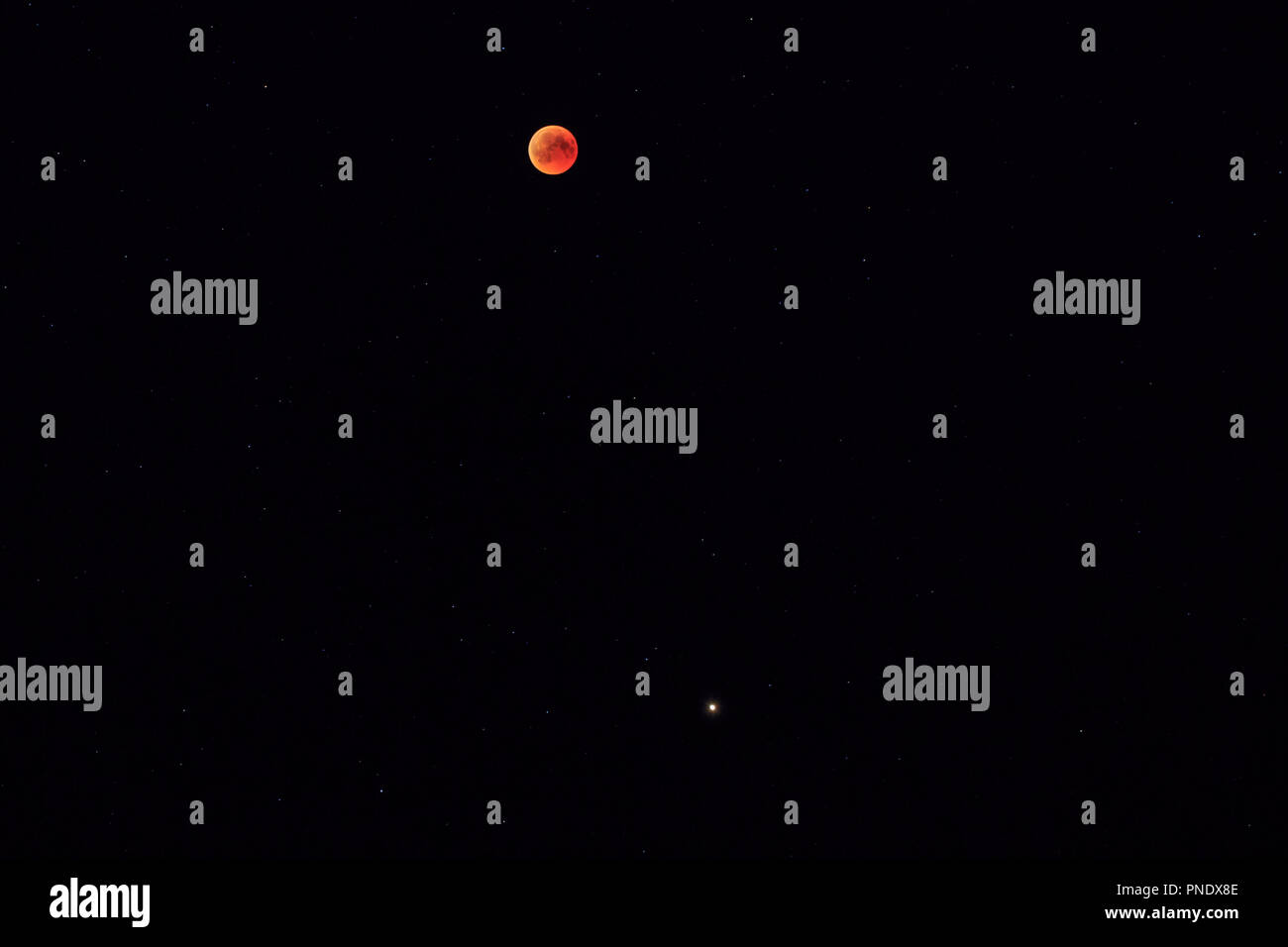 Moon and mars during lunar eclipse in 27 July 2018 Stock Photo