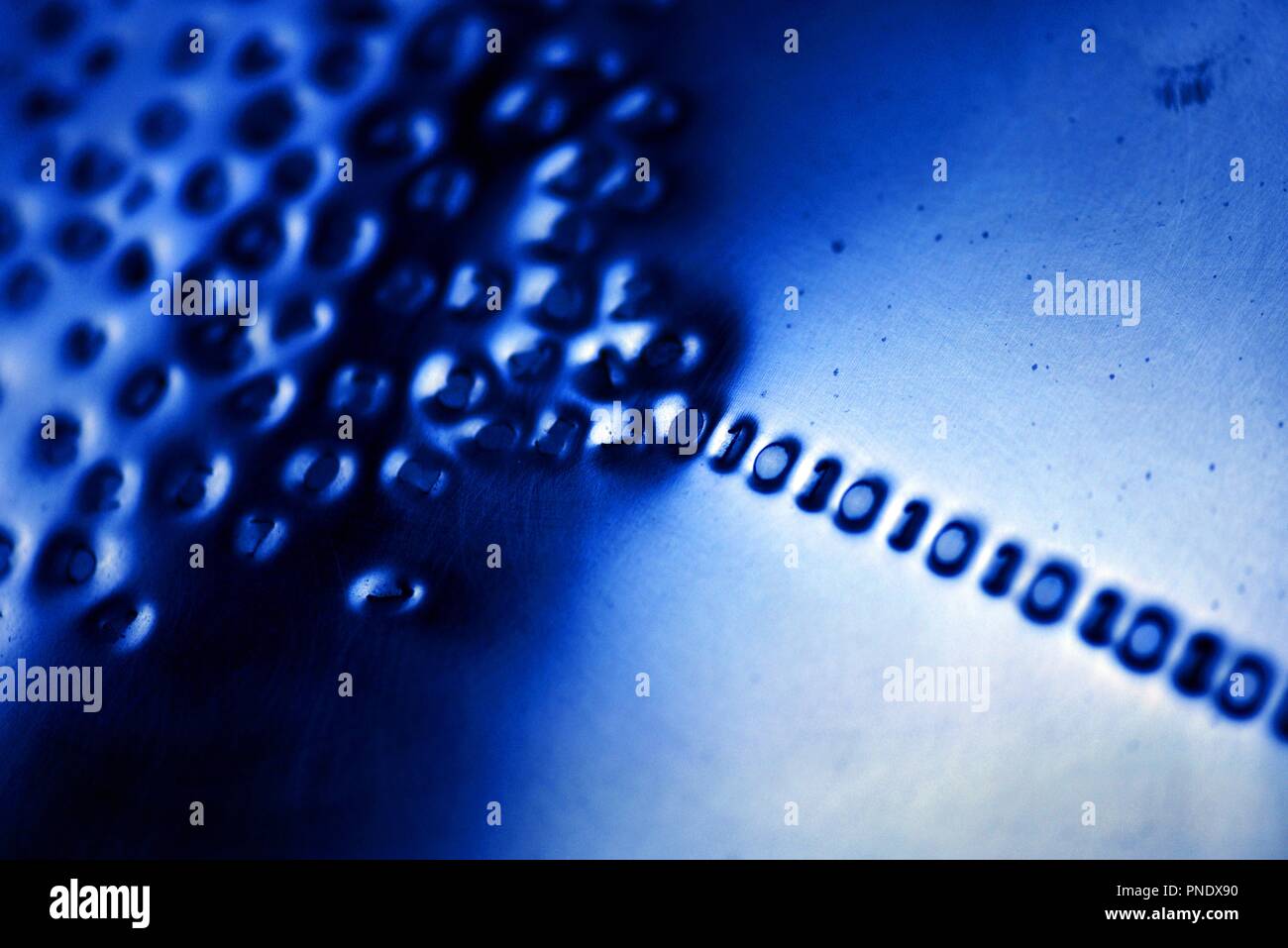 Binary code: digital language emerging from a numerical cloud Stock Photo