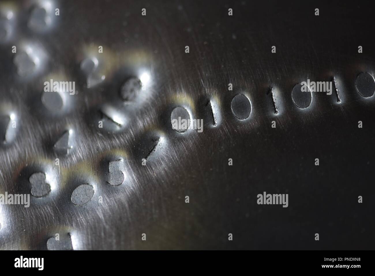 Binary code: digital language emerging from a numerical cloud Stock Photo