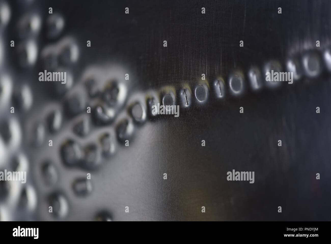 Binary code: digital language emerging from a numerical cloud Stock Photo