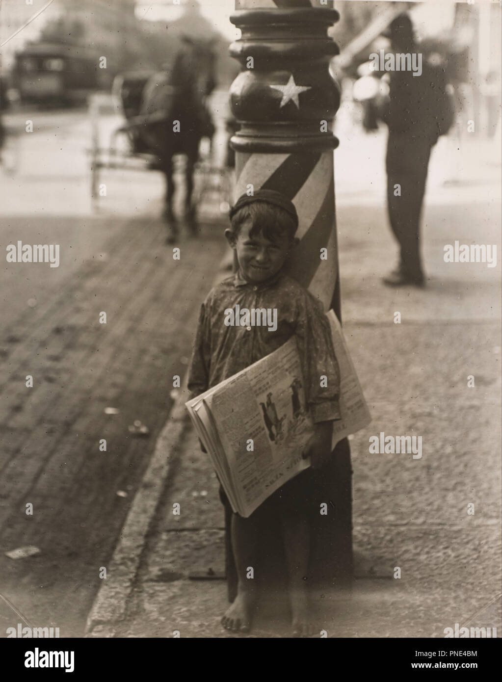 A Little Shaver, Indianapolis. Date/Period: 1908, printed ca. 1920. Photograph. Gelatin silver print. Author: Hine, Lewis Wickes. Stock Photo