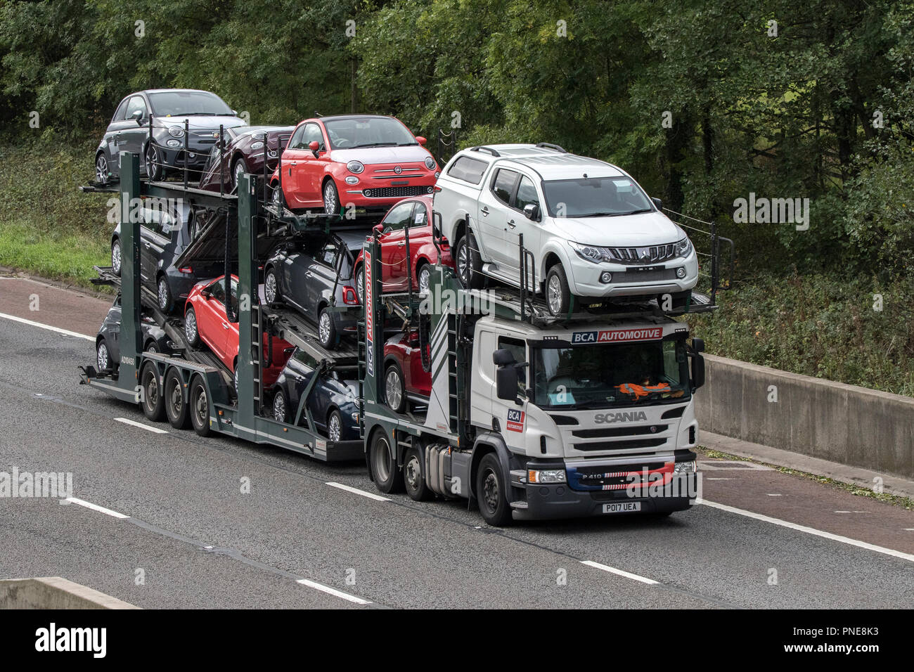 Car Transporter HGV Heavy goods lorries, trucks & trucking,  logistics used transport vehicles on the M6 at Lancaster, UK Stock Photo