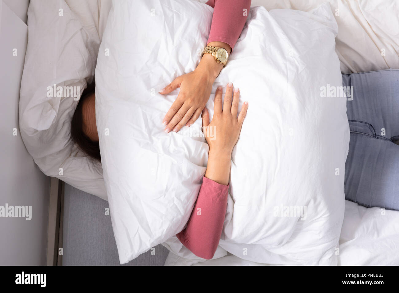 Woman holding pillow face hires stock photography and images Alamy