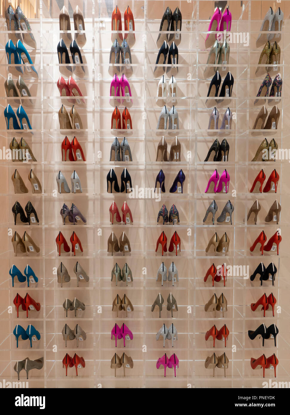 Rows of womens shoes in SJP Sarah Jessica Parker shoe store inside Dubai Mall, UAE Stock Photo
