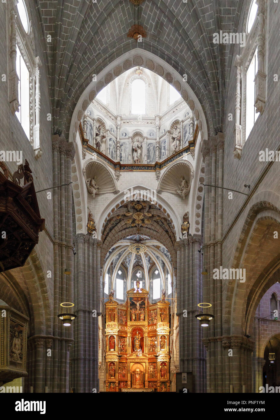 The central nave, the dome and the baroque retable next to the altar of the Nuestra Señora de la Huerta gothic mudejar cathedral in Tarazona,  Spain Stock Photo
