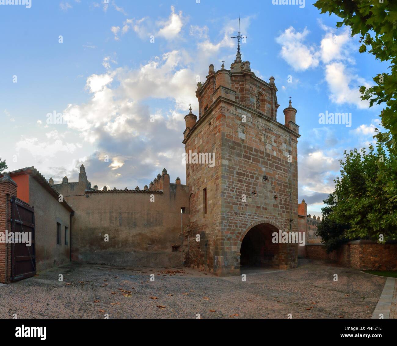 A landscape of the the gothic defense and entrance tower and the walls at the entrance of the Veruela Cistercian abbey at the sunset, in Aragon, Spain Stock Photo