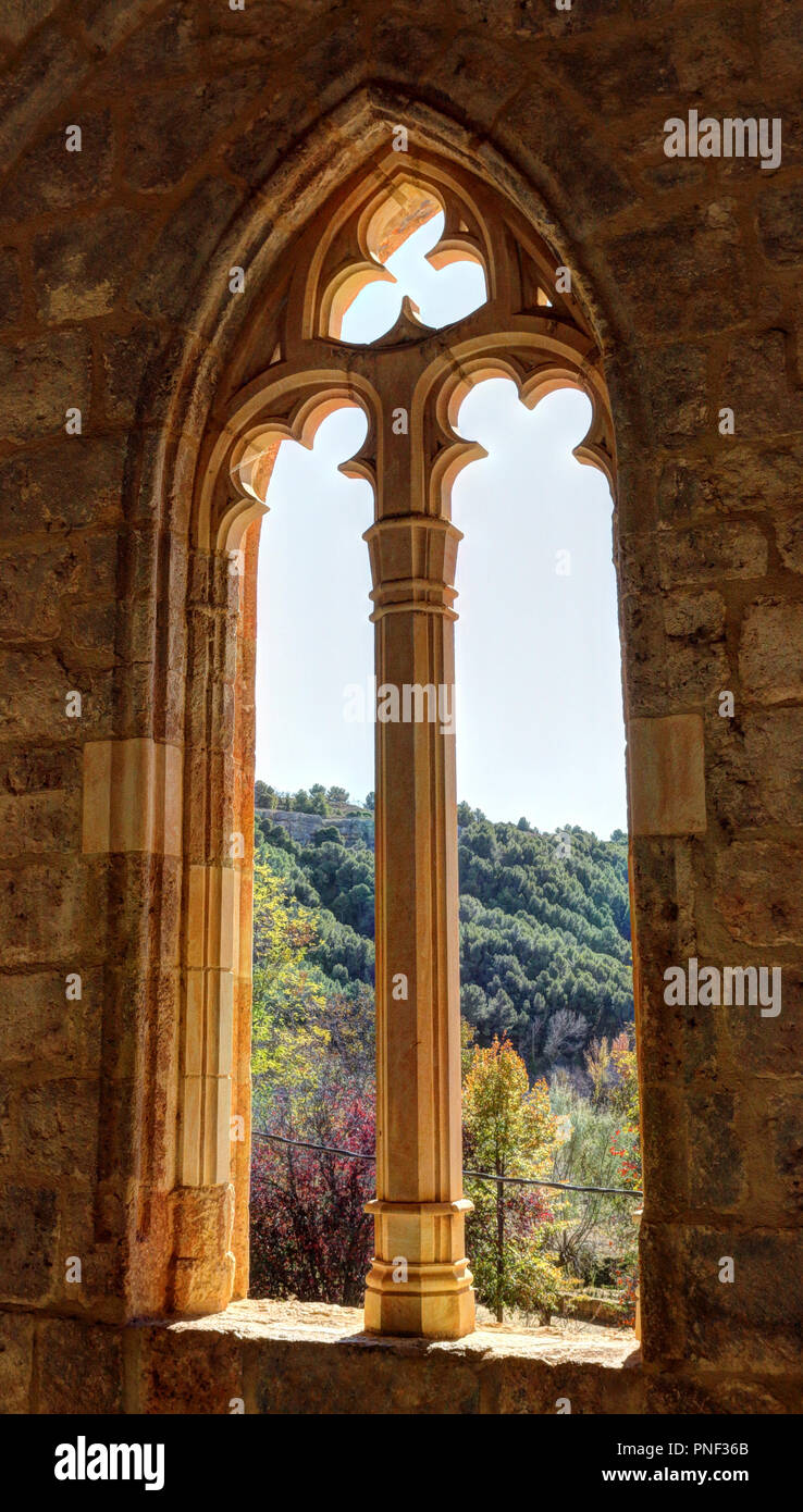 The Gothic pointed arch window with decorations at the entrance of the Saint Blaise church (Iglesia de San Blas) in the Anento small town, Spain Stock Photo
