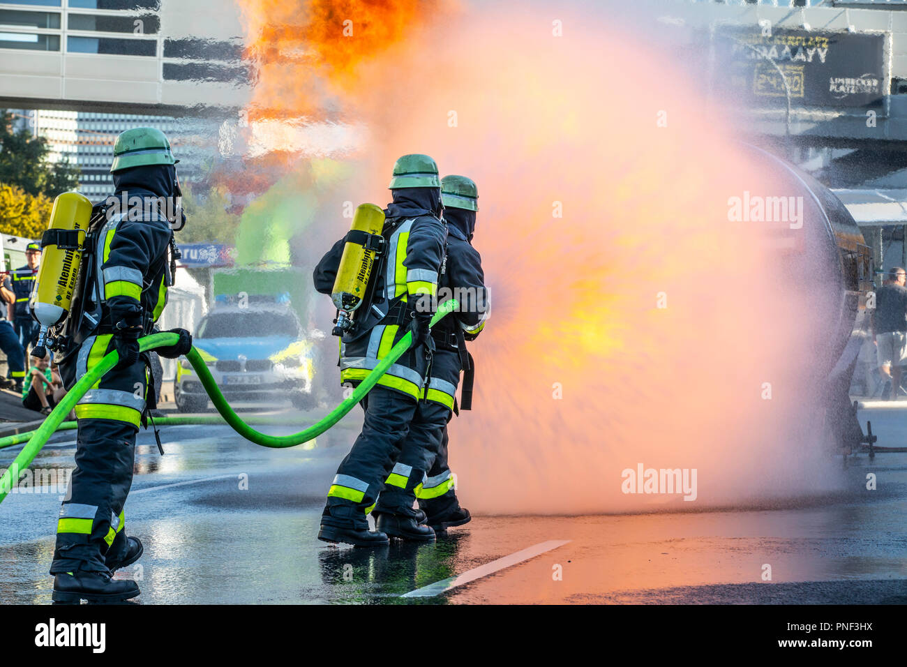 Firefighters in fire fighting, exercise, fire simulator for chemical fires,  fire department Essen, Germany Stock Photo