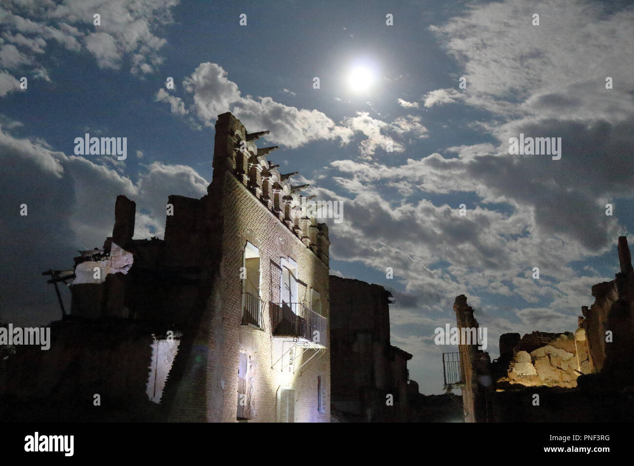 A rumbled brick house while visiting, as a tourist, the destroyed