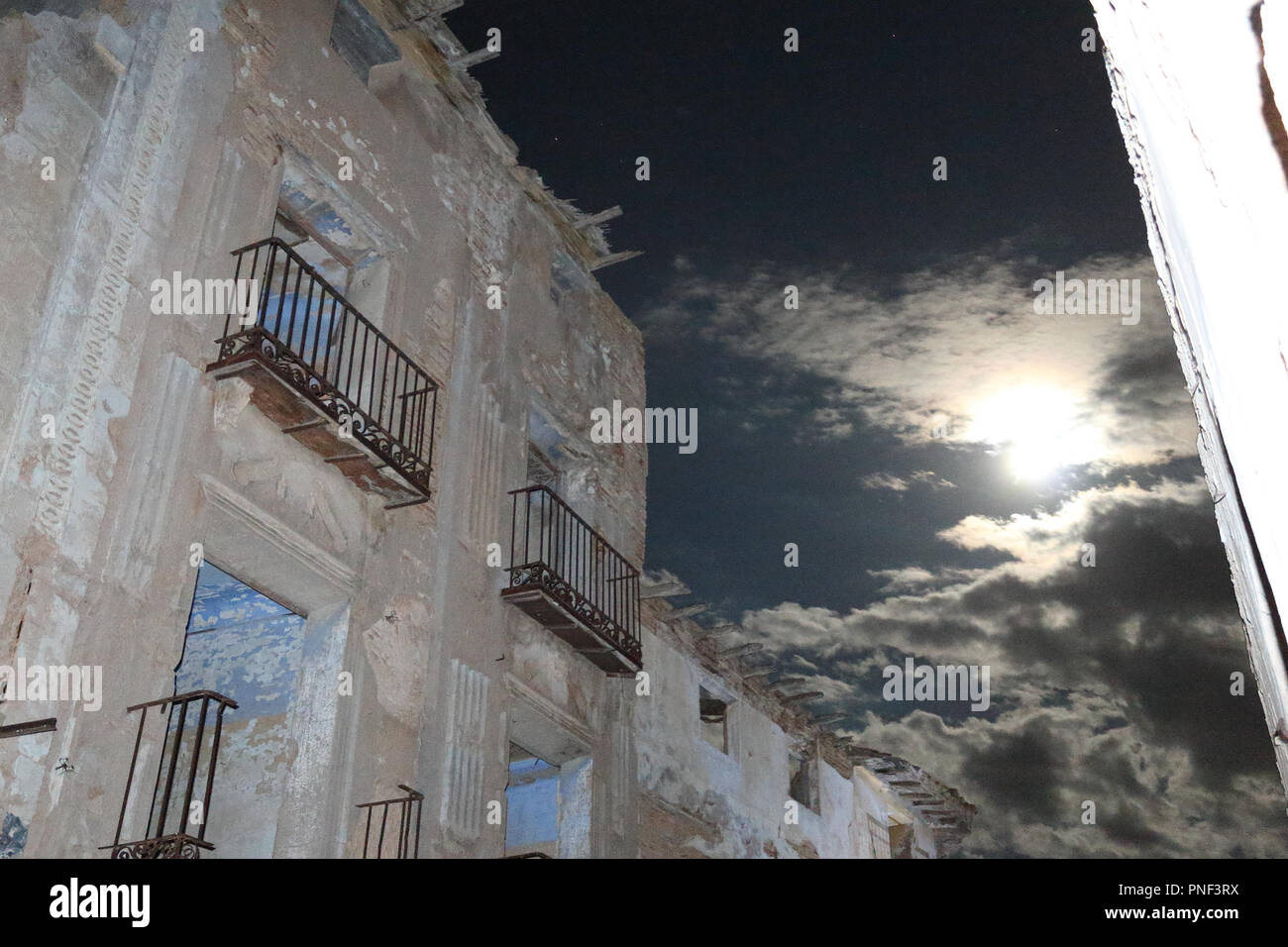 A rumbled brick house while visiting, as a tourist, the destroyed