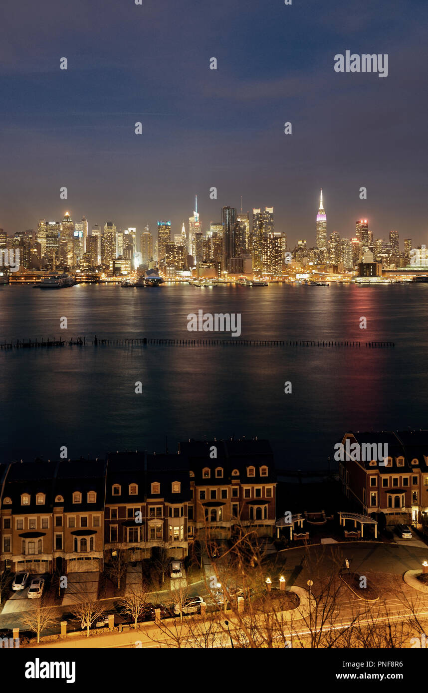 Midtown skyline over Hudson River in New York City with skyscrapers at ...