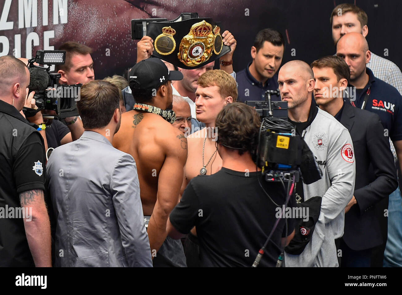 London, UK. 21 September 2018. Anthony Joshua and Alexander Povetkin at the  official weigh-in, at the Business Design Centre in Islington, ahead of the  Anthony Joshua vs Alexander Povetkin world-heavyweight fight. Povetkin