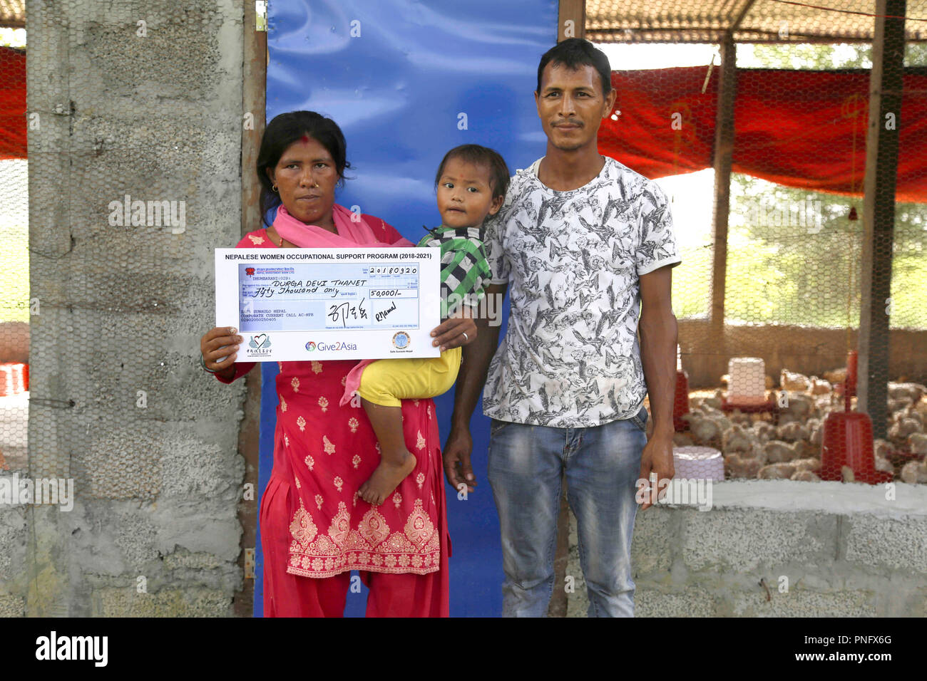 Kathmandu, Nepal. 20th Sep, 2018. Local farmers pose with seed money provided by the China Foundation for Poverty Alleviation (CFPA) in Nawalpur district, Nepal, Sept. 20, 2018. The CFPA, a Chinese non-governmental organization (NGO), has launched a micro-finance project 'Nepalese Women Occupational Support Program' in Nepal. Credit: Sulav Shrestha/Xinhua/Alamy Live News Stock Photo