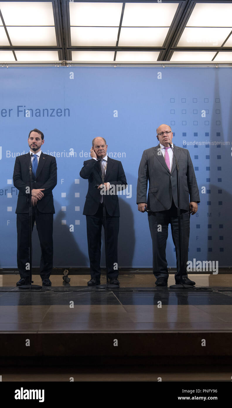 21 September 2018, Berlin: Berat Albayrak (left to right), Finance Minister of Turkey, German Minister of Finance Olaf Scholz (SPD) and German Minister of Economics Peter Altmaier giving a joint press conference after their meeting in the Ministry of Finance. Photo: Soeren Stache/dpa Credit: dpa picture alliance/Alamy Live News Stock Photo